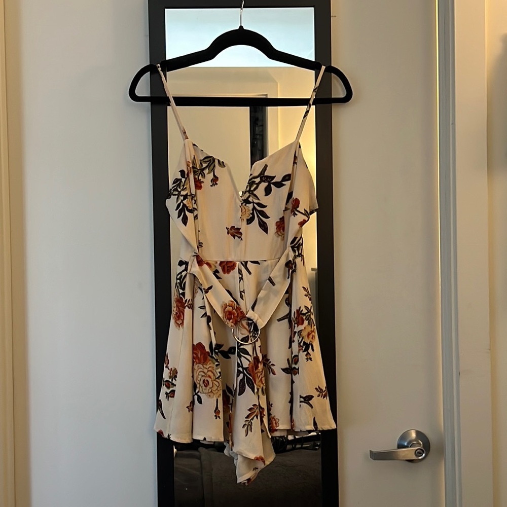 Cream floral romper with belt size small